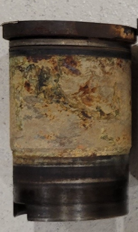 Removed cylinder sleeve before cleaning.jpg